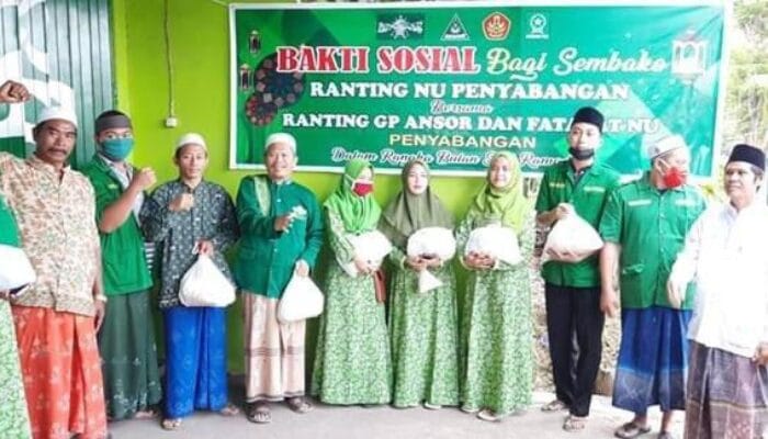 PEMBAGIAN SEMBAKO OLEH RANTING NU PENYABANGAN BERSAMA RANTING ANSOR & FATAYAT NU PENYABANGAN BALI