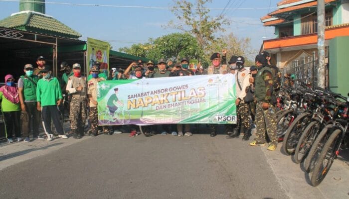 Sebarkan Semangat Kampanye Prokes dan Baksos, Ansor-Banser di Sidoarjo Gowes Bareng